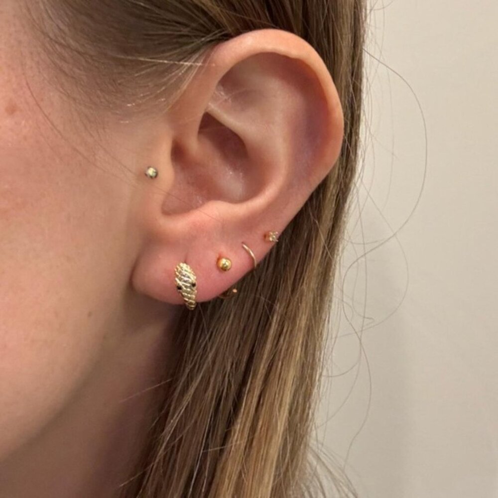 The Rory Gold open huggie hoop earrings